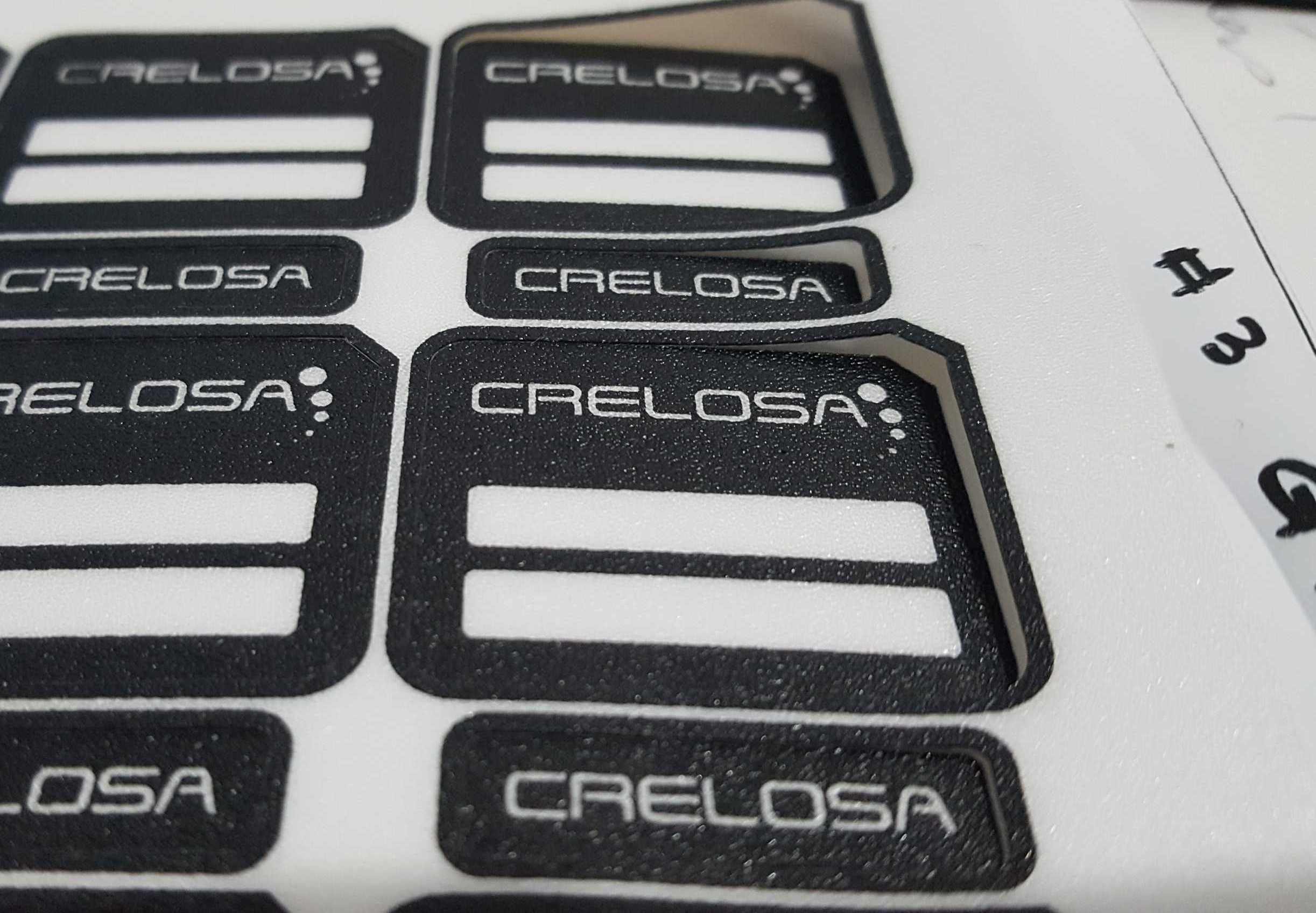 Etiquetas laminadas, de poliéster y resinadas